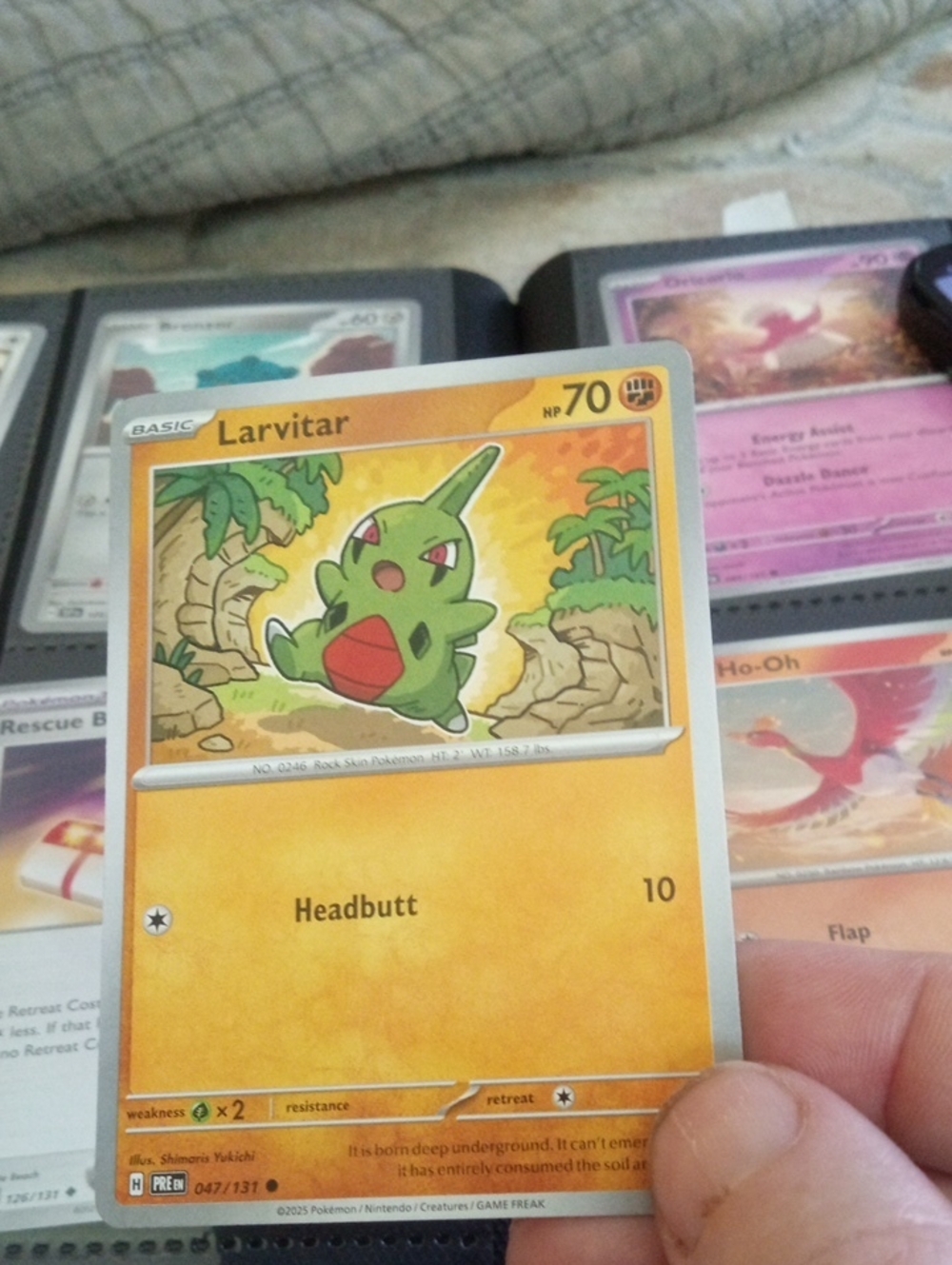 Pokemon Larvitar Trading Card - Yellow and Green